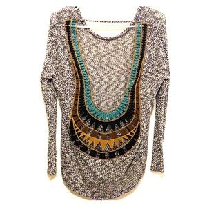 Barely worn exposed back sweater.